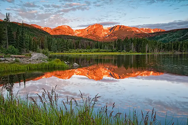 Sprague Lake Sunrise reflection in summer in Rocky Mountain National Park